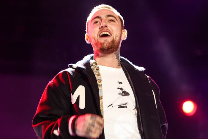 Mac Miller performs onstage in 2014