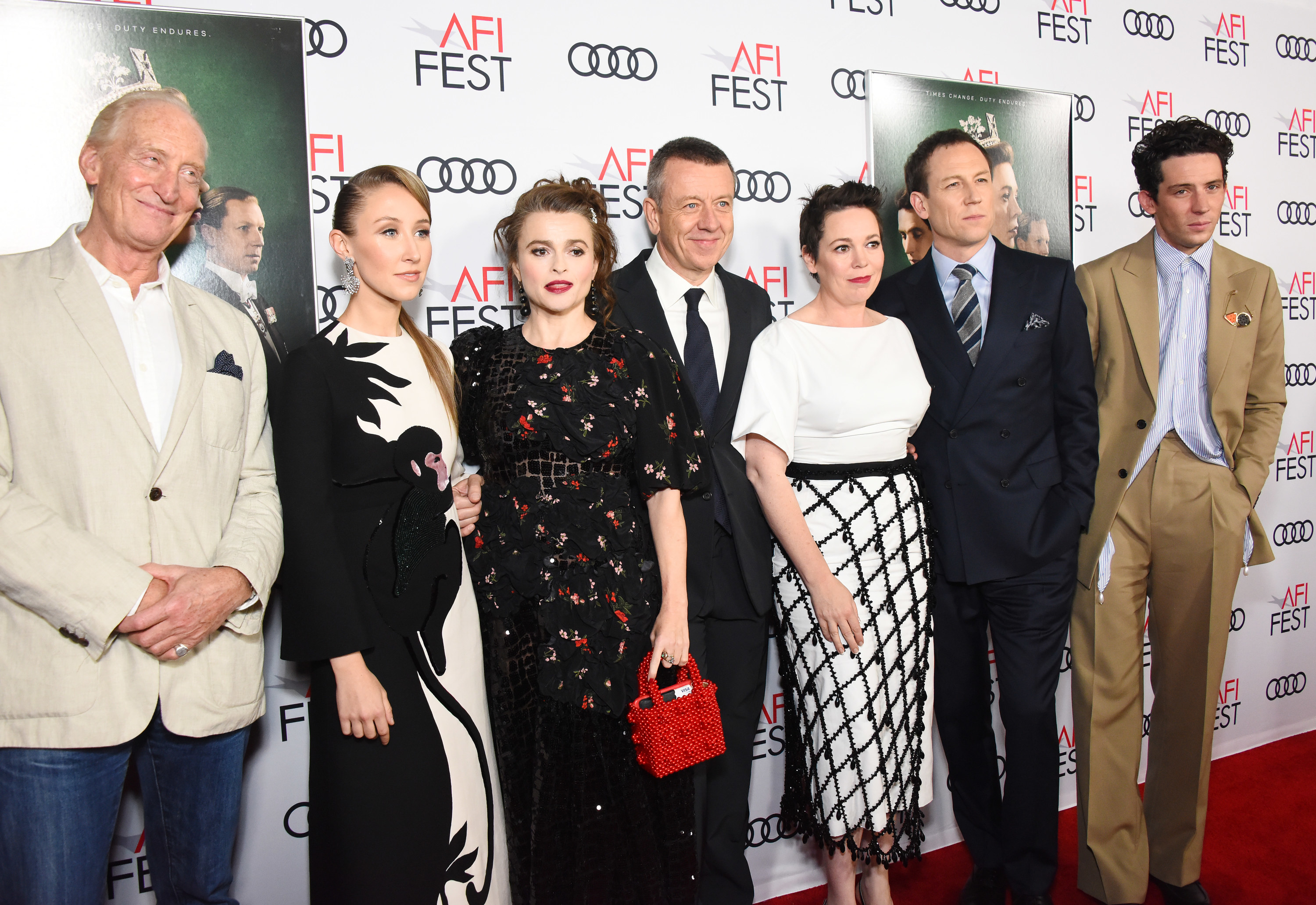 Charles Dance, Erin Doherty, Helena Bonham Carter, Peter Morgan, Olivia Colman, Tobias Menzies, and Josh O&#x27;Connor are photographed at a red carpet event