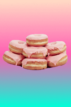 A pile of frosted donuts shaking together in the middle of a colored gradient