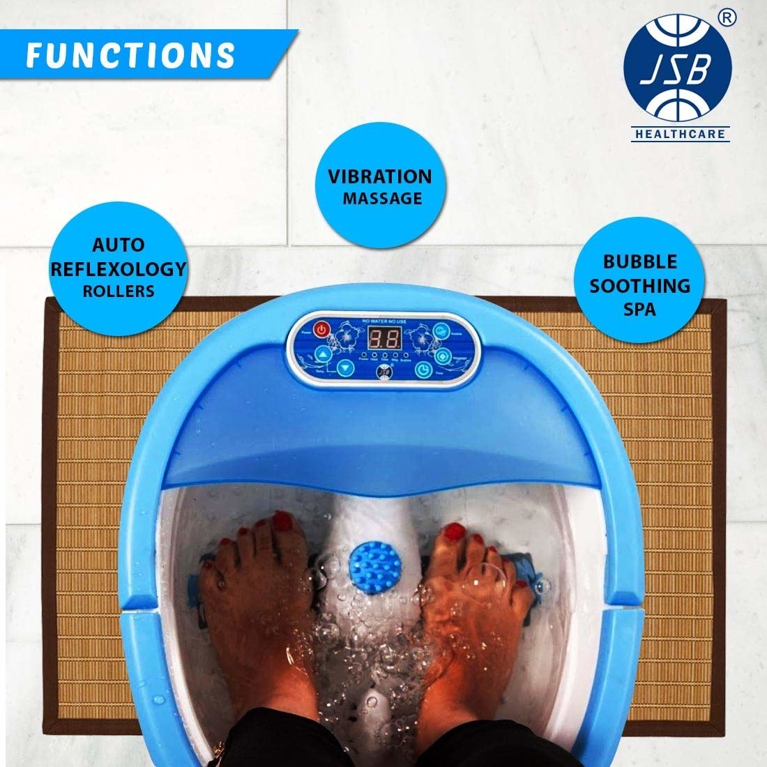 A persons feet in the foot bath with the various modes