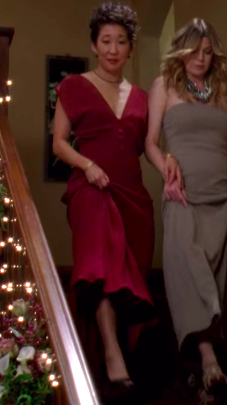 Cristina wearing a nice non-white dress