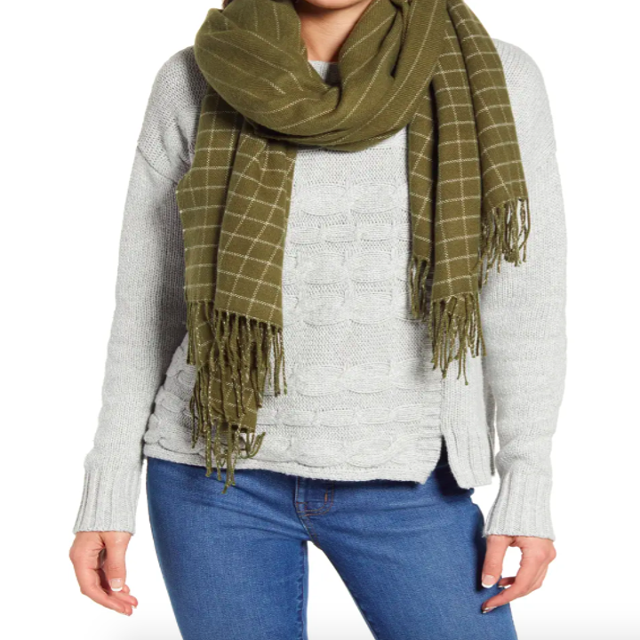 A model wearing the scarf wrapped around their neck