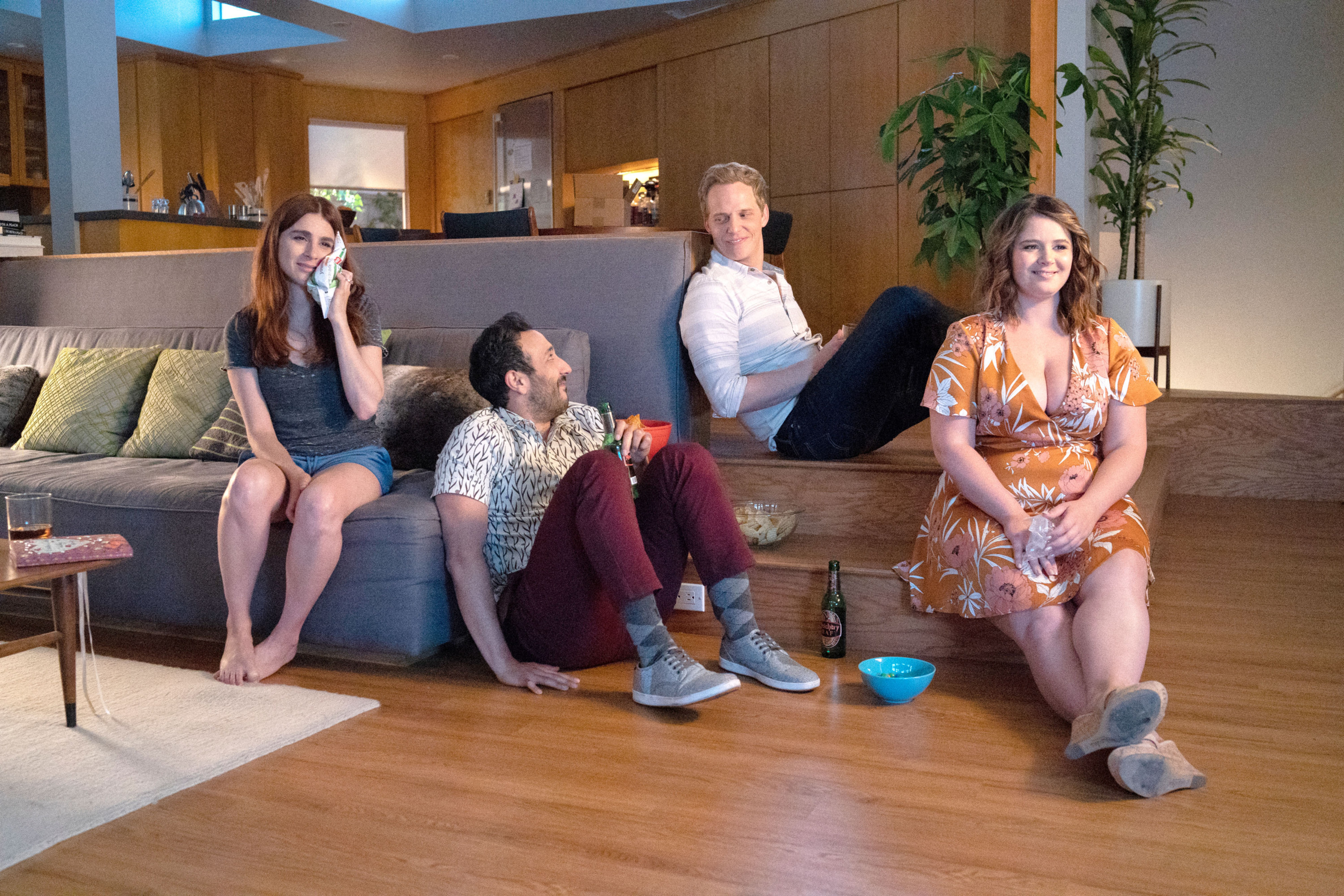 Aya Cash, Desmin Borges, Chris Geere, and Kether Donohue sitting on the couch and chatting as Gretchen, Edgar, Jimmy, and Lindsay on &quot;You&#x27;re the Worst&quot;