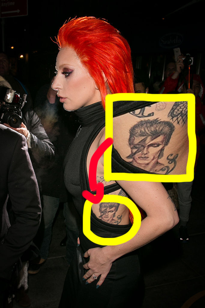 the rock icon is inked on her ribcage