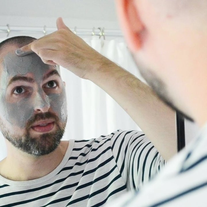 person applying smoothing face mask