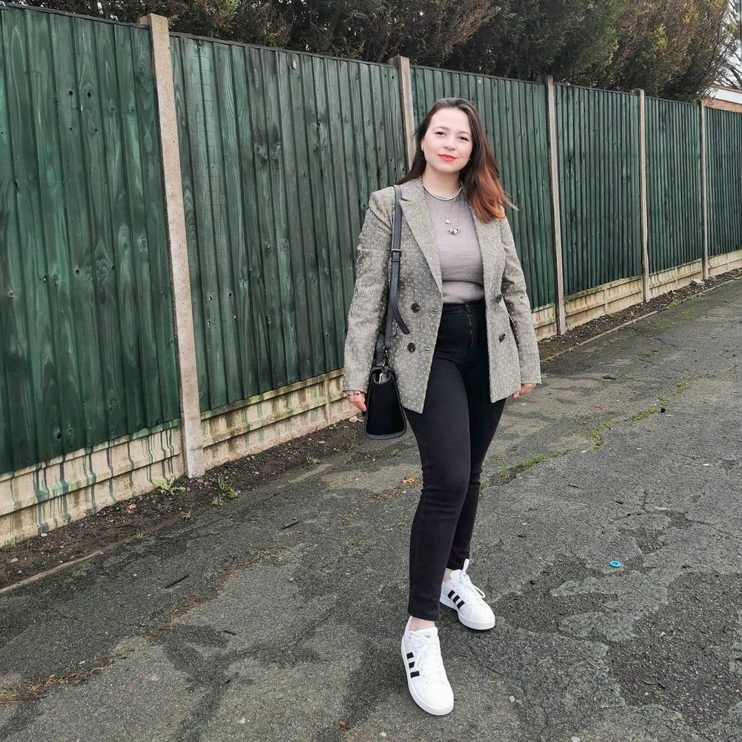 white shoes with three black stripes