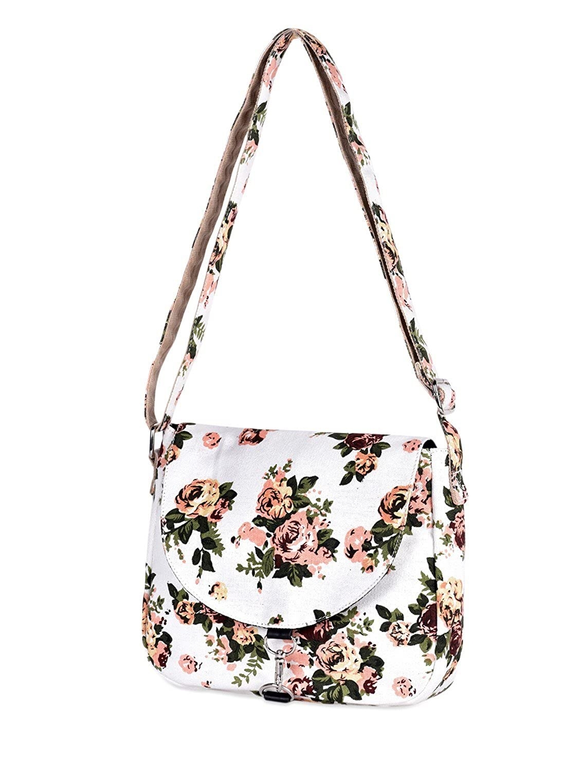 A white sling bag with pink flowers and green leaves printed all over it