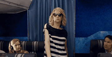 kristen wiig strutting on an airplane on &quot;bridesmaids&quot;