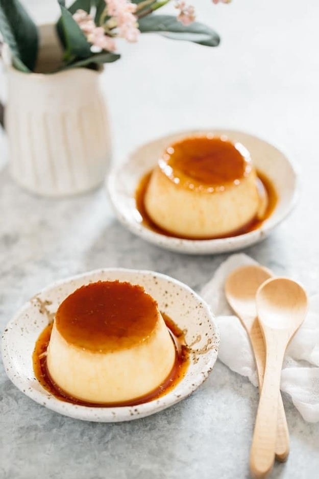 Japanese pudding in shallow bowl with caramel sauce drizzled over it.