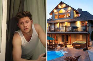 Nial Horan is hanging out a window while looking at a house with a pool