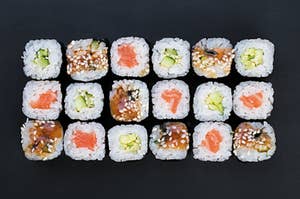 a couple different cut up sushi rolls 