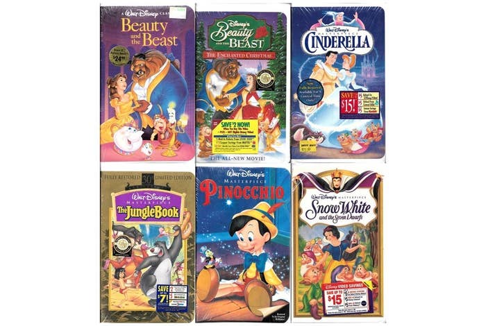 Six different Disney VHS tapes still in the wrapping