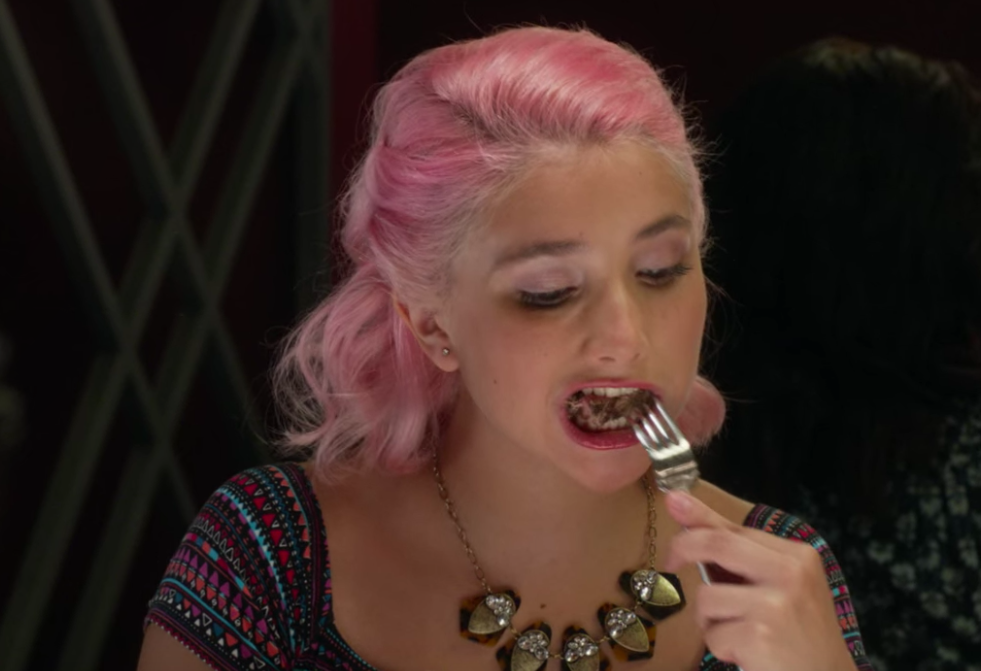 Lola on Degrassi stuffing food into her mouth