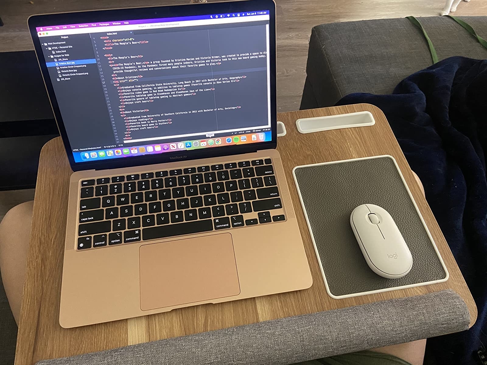 a reviewer image of the lap desk with a mouse and laptop on it