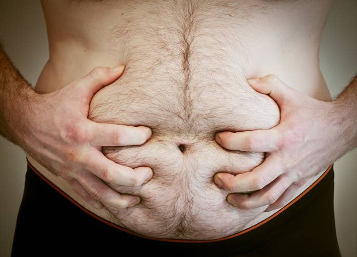 A man holding his stomach