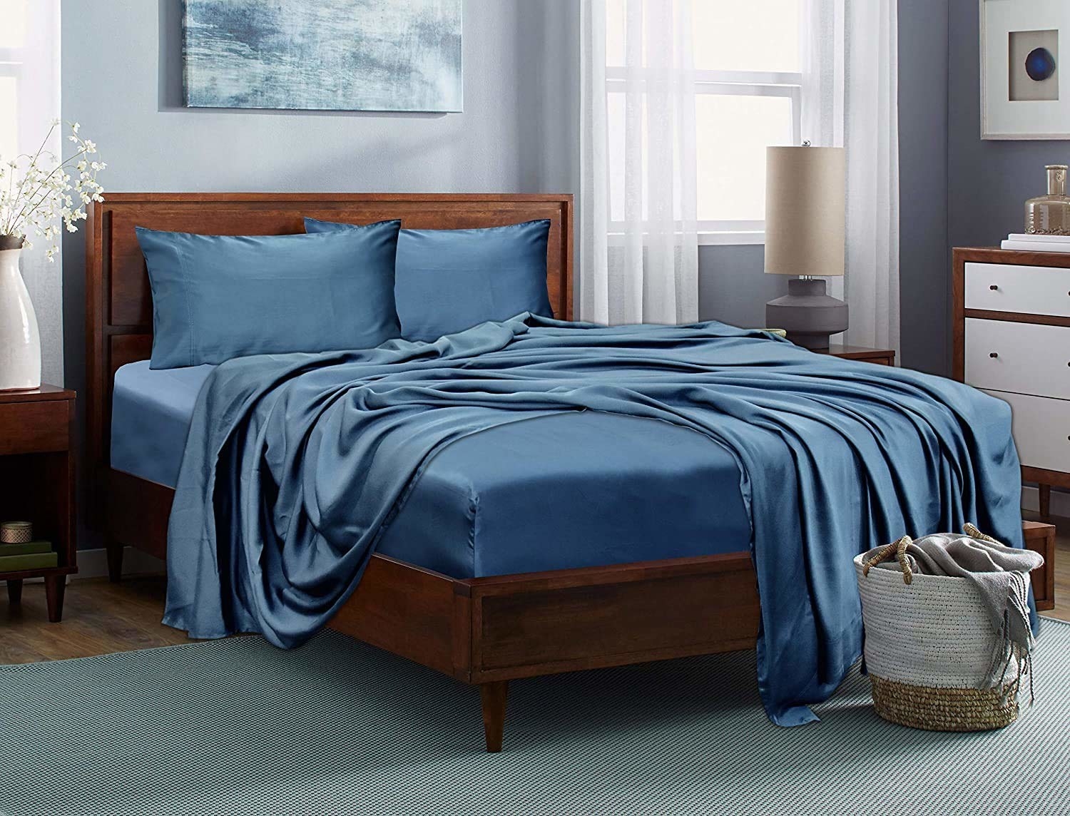Blue bedsheet and pillow covers on a bed