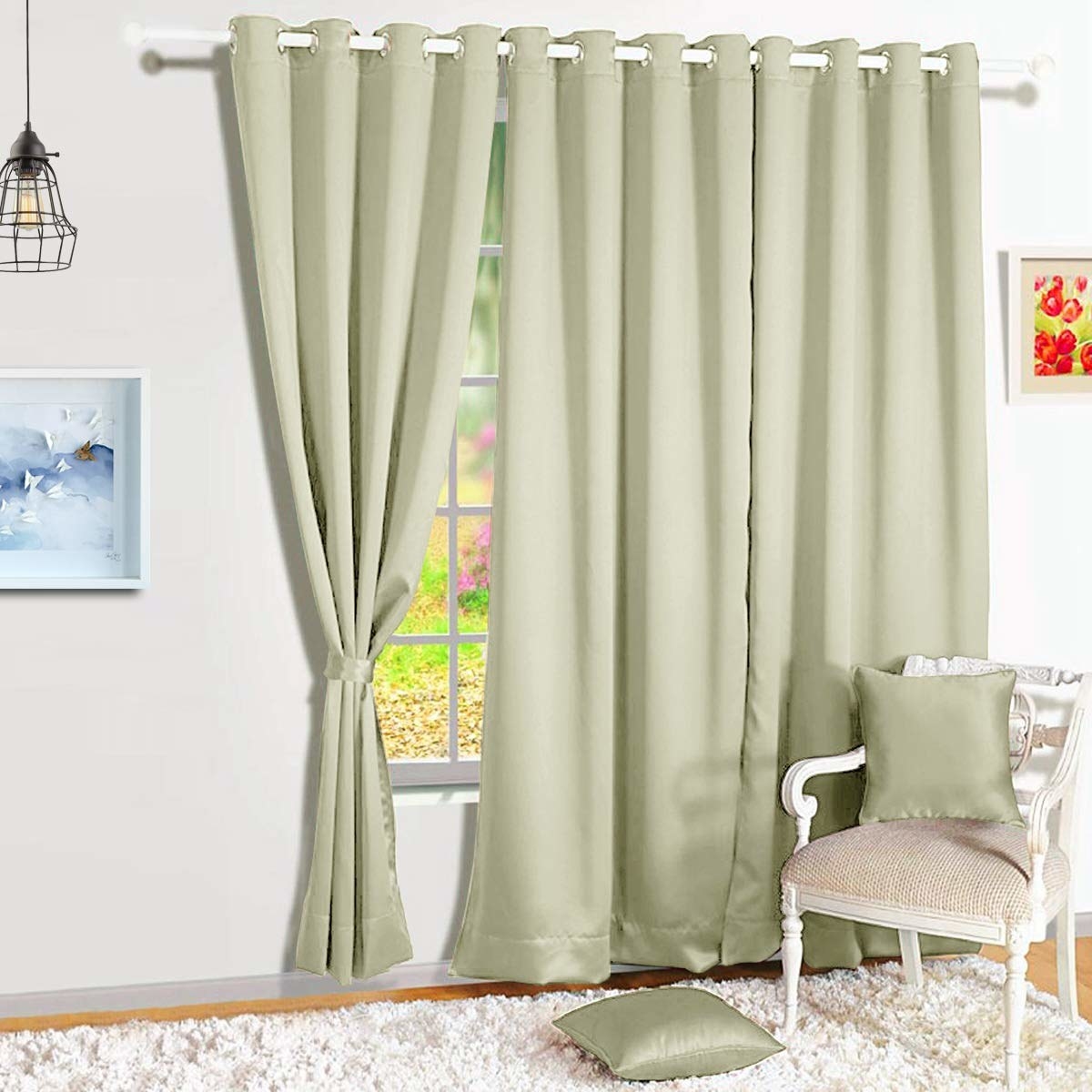 Cream-coloured blackout curtains in a room with rug and chair
