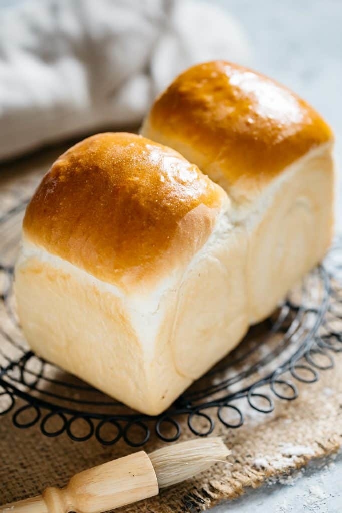 Shiny loaves of milk bread.