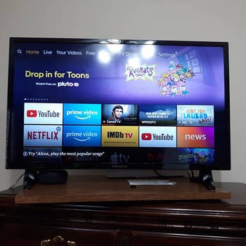 a reviewer photo of the smart TV turned on 