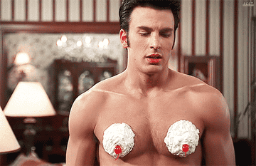 Chris Evans with whipped cream on his pecs sighing and turning