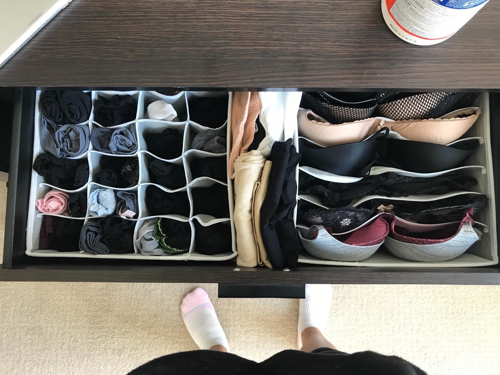 reviewer image of the drawer organizer being used to organize underwear and bras