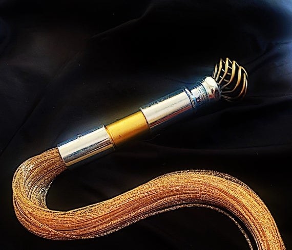 Silvertone and gold flogger