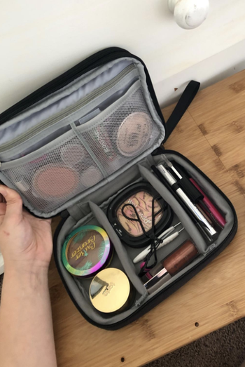makeup in the compartmentalized bag