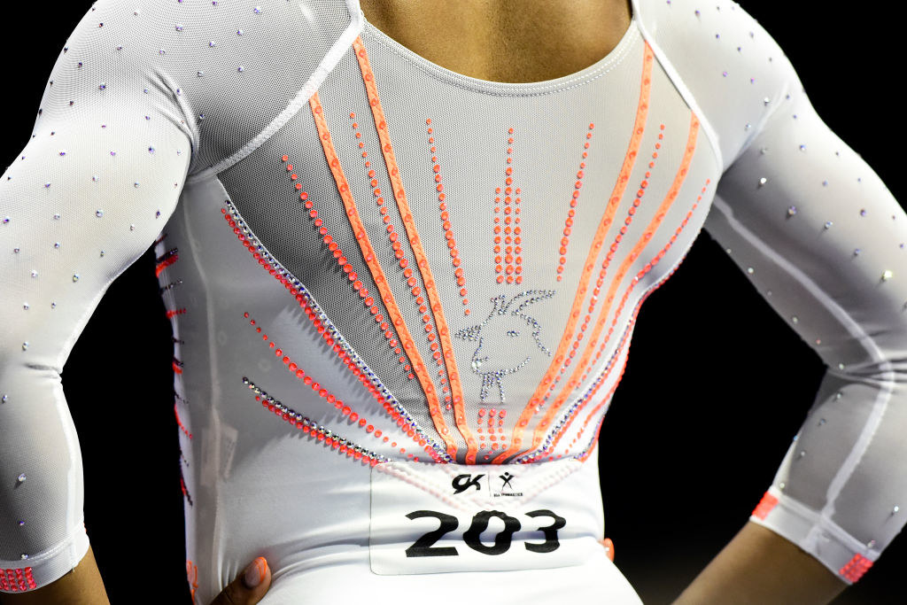 Simone Biles wears a rhinestone goat on her leotard during the 2021 GK U.S. Classic gymnastics competition