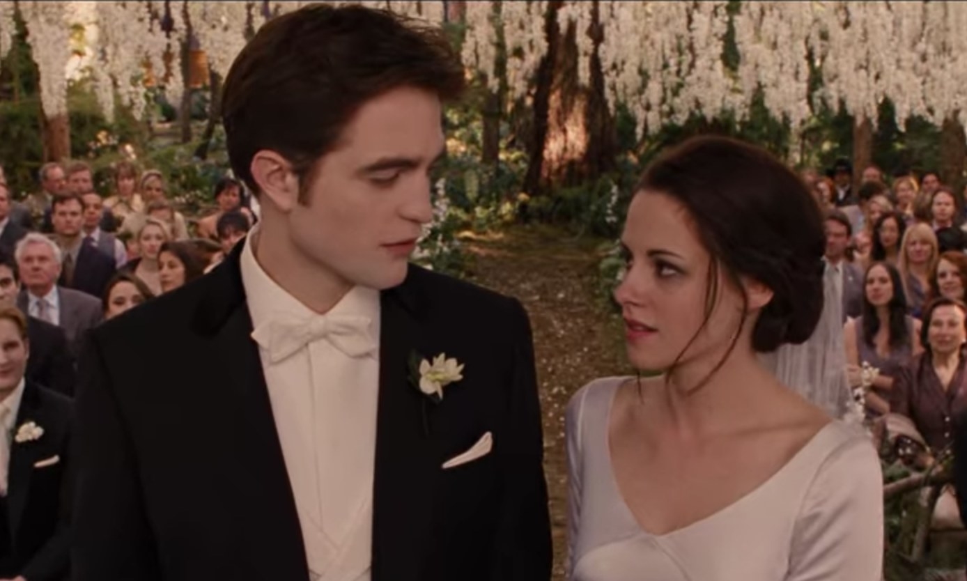 Edward and Bella stare into each other&#x27;s eyes on their wedding day