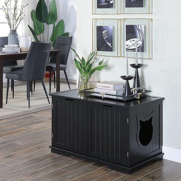 The enclosure in black being used as an accent table