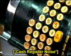 A cash register opening up showing money