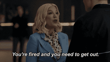 A woman telling someone they&#x27;re fired and they need to get out