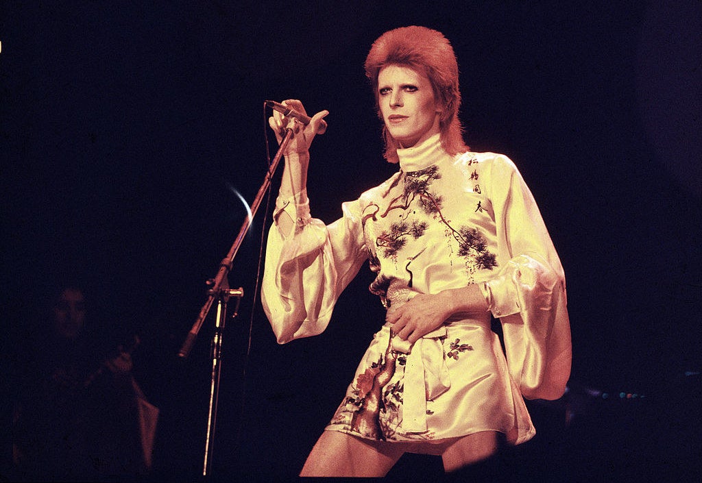 David Bowie performs on stage in the 70s