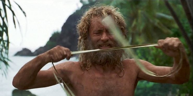 tom hanks in cast away pulling at a rope