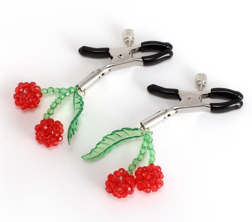 Silvertone and black nipple clamps with red and green beaded cherries