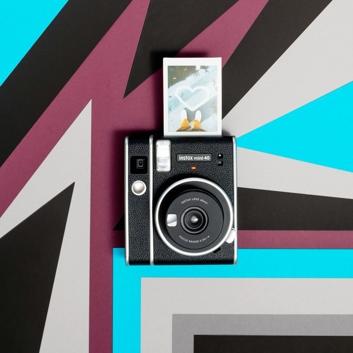 A retro camera on a floor