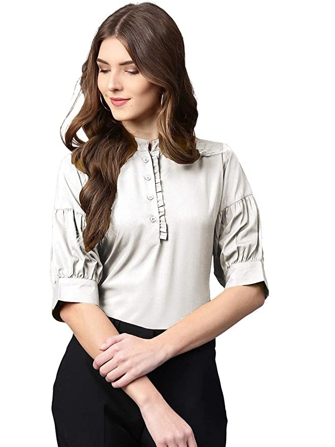 White shirt with ruffle sleeves