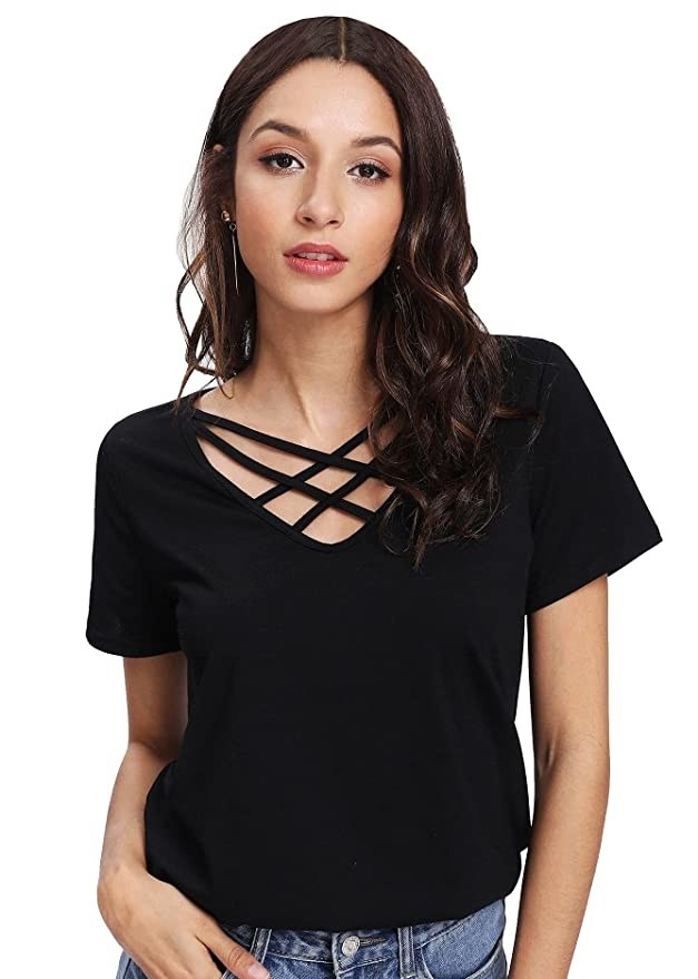 Black T-shirt with cut out detailing in the front