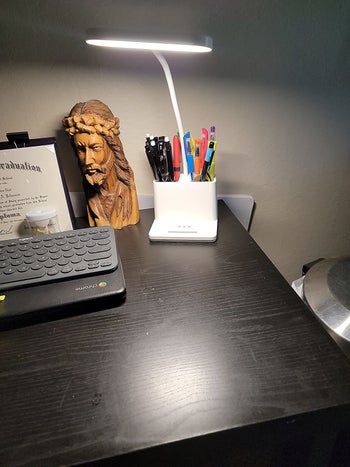 reviewer image of the LED desk lamp on a desk