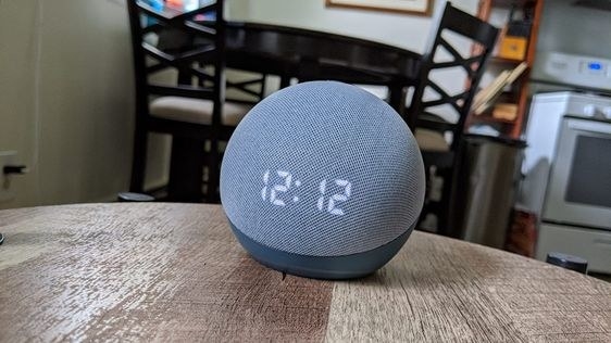 reviewer&#x27;s picture of the alexa in their kitchen