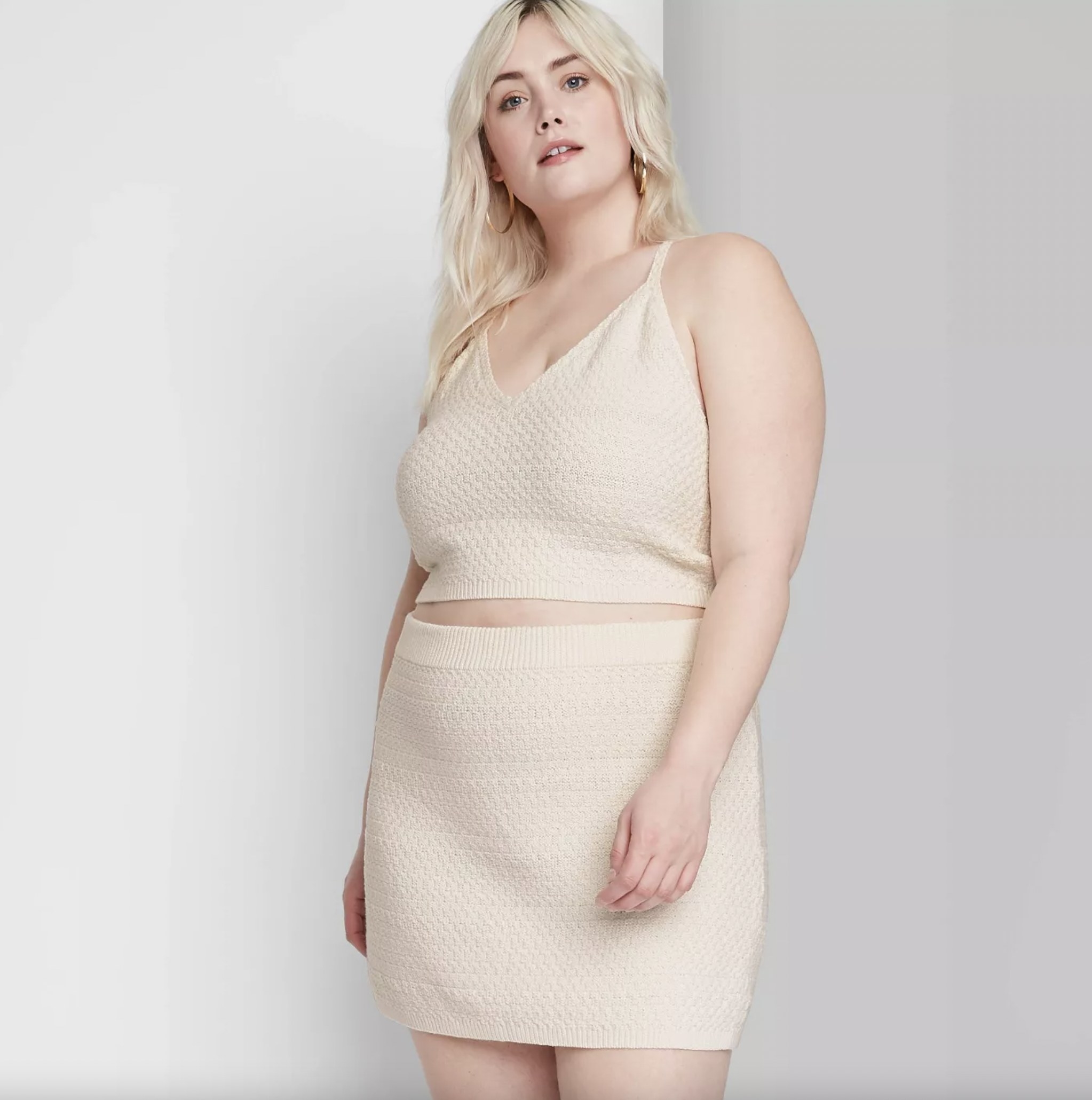 The cream-colored knit skirt