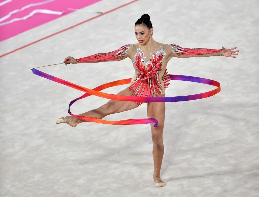 Rut competing in 2019 in a sequined leotard