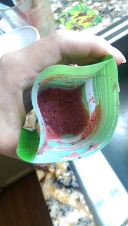Reviewer's photo showing the reusable pouch containing fruit puree