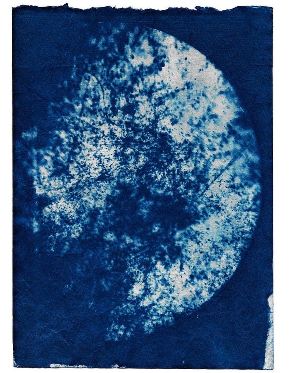 A blue photograph of pollution in London captured with an old photo technique