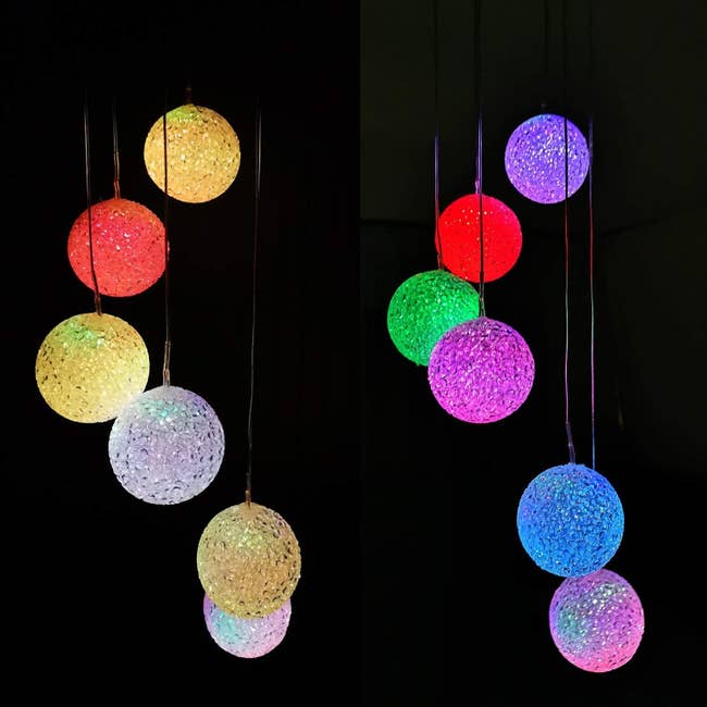 The wind chimes at night glowing in different colors