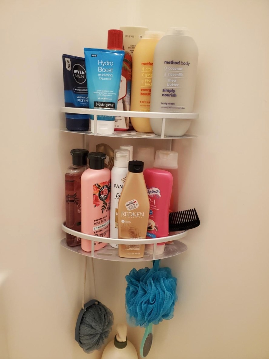the two-tier shower caddy holding bath products in white