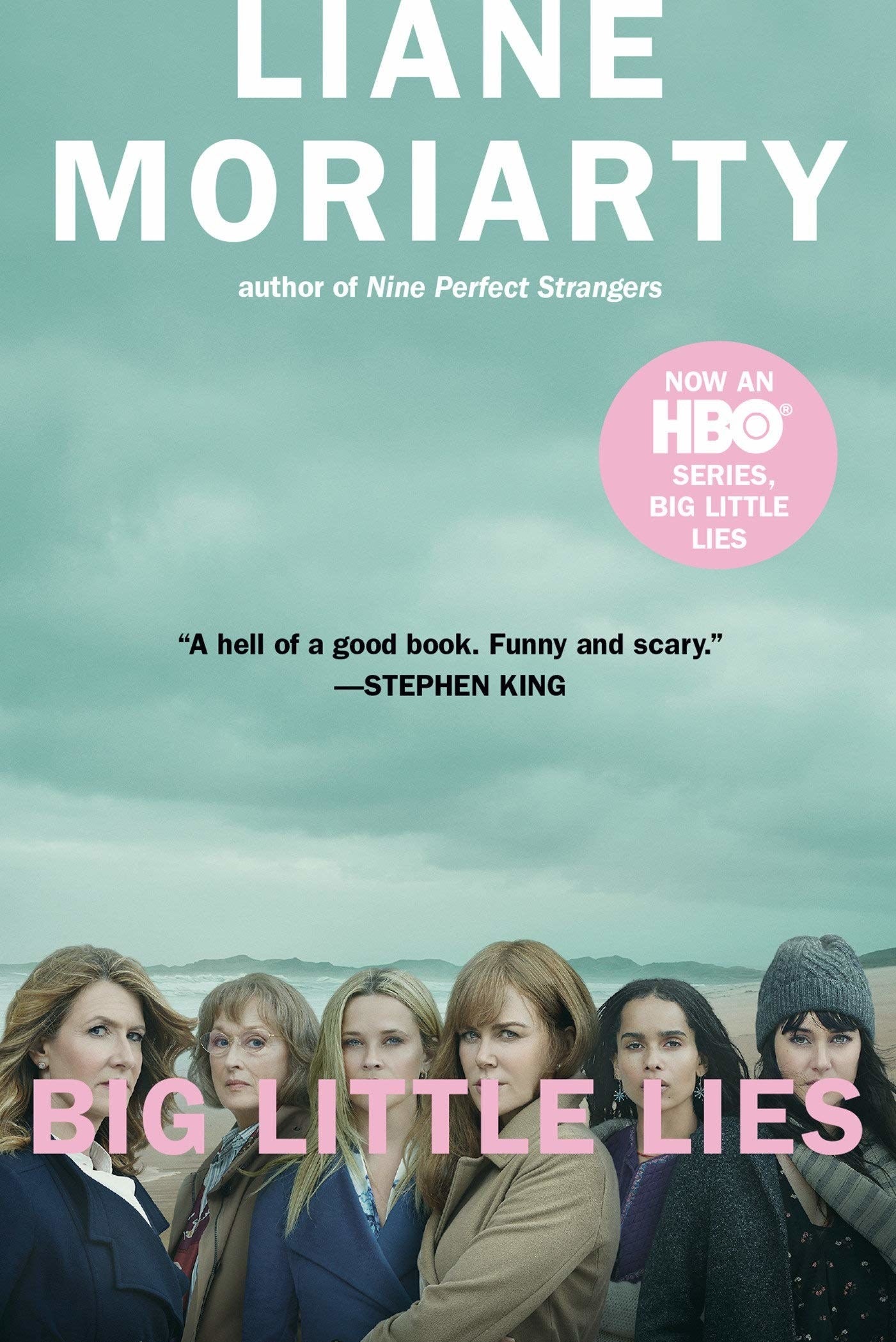 The cover of the book featuring the TV adaptations cast, including Zoe Kravitz, Reese Witherspoon, Nicole Kidman, and Laura Derne