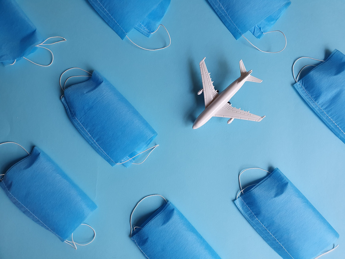 Multiple masks and a small airplane