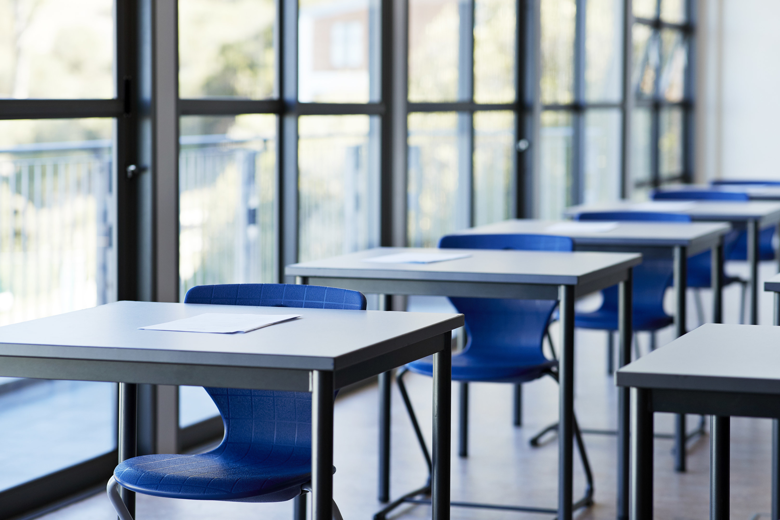 A university classroom with desks