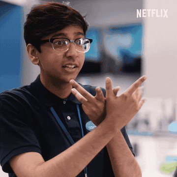 GIF of Zahid making a butterfly with his hands